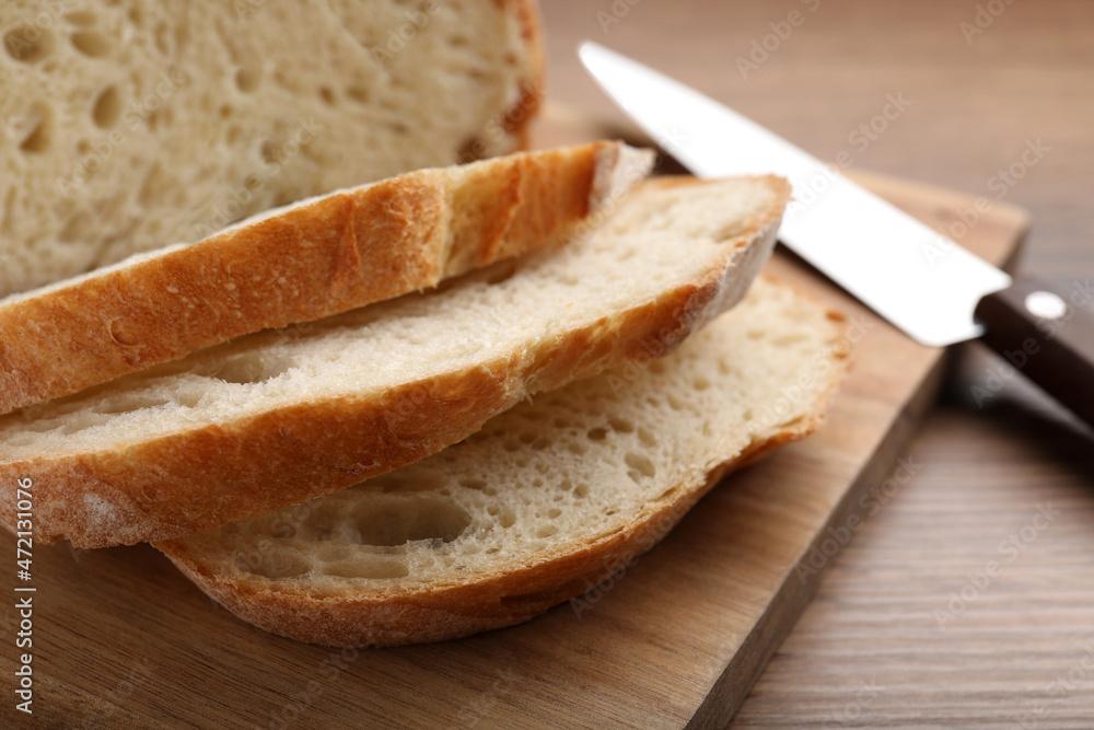 Cut tasty wheat sodawater bread on wooden table, closeup Cut tasty wheat sodawater bread on wooden table, closeup