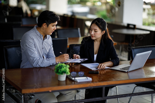 legal and businessman advisor, two business people talking, planning analyze investment and marketing on a tablet at outdow office.