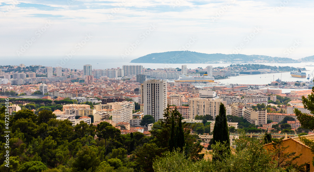 Panoramic photo of Toulon, France. View of residential buildings and city port.
