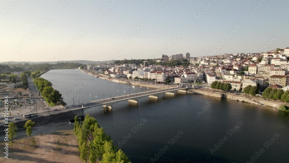 Santa Clara bridge, Modego river and Coimbra cityscape, Portugal Santa Clara bridge, Modego river and Coimbra cityscape, Portugal