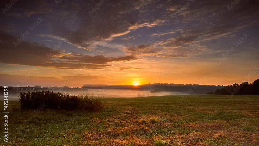 Golden sunrise over a field in North Carolina.
