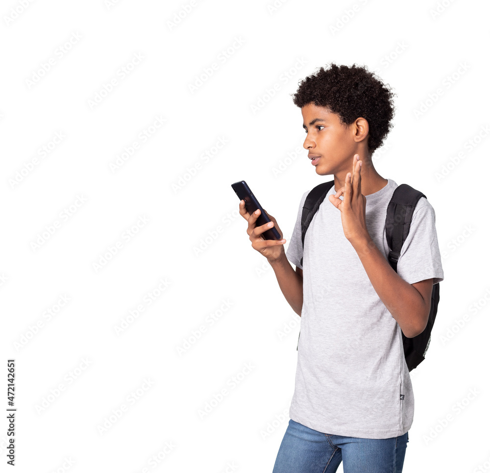 A adolescent afro latino sending a message voice by cell A adolescent afro latino sending a message voice by cell