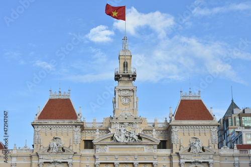 People's Committee of Ho Chi Minh City Upper Central Facade Detail with Flag, Frieze, and Clock Tower