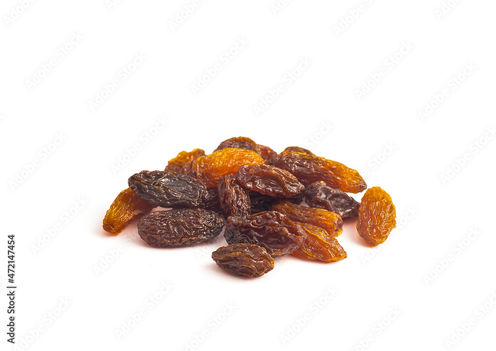 An image isolated close-up pile raisin or grape on a white background is a fruit dried flavour sweet for ingredient mix dessert.