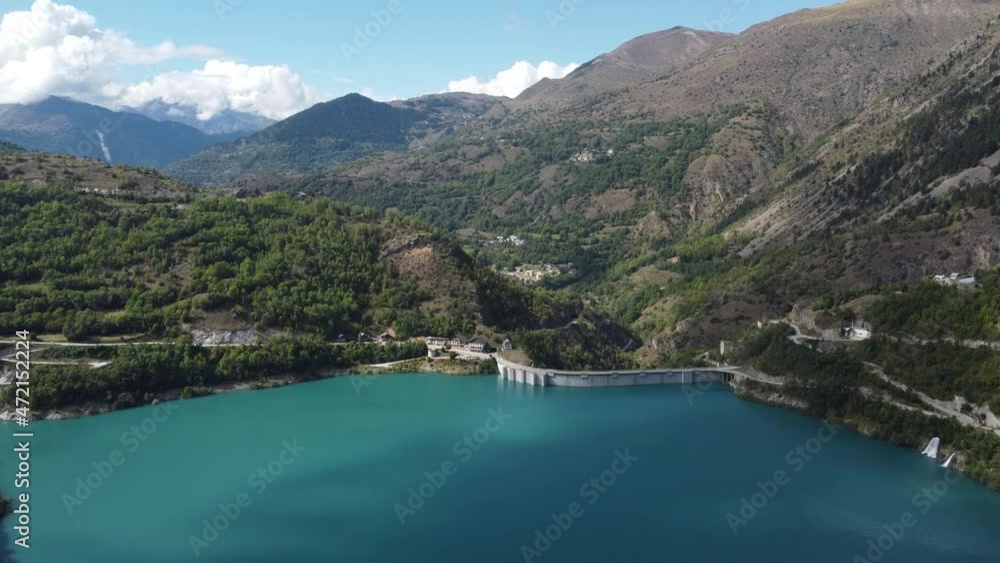 Chambon lake aerial view calm clear water river in the middle of France alps mountains Chambon lake aerial view calm clear water river in the middle of France alps mountains