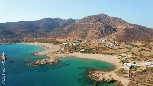 aerial drone view of magganari bay beach in ios island. Ios island is located in the Cyclades group in the Aegean Sea. luxury accommodation in greece Video. photo