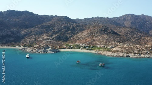 aerial view of lux villa with private beach in ios island. ios island located in the Cyclades group in the Aegean Sea. video of mylopotas beach popular destination in greece. photo