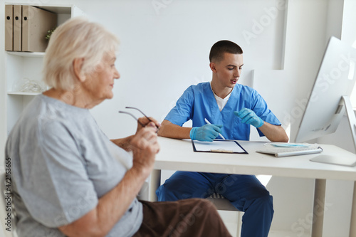 the patient talks to the doctor professional consultation