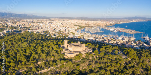 Castell de Bellver castle with Palma de Mallorca and harbor travel traveling holidays vacation aerial photo panorama in Spain