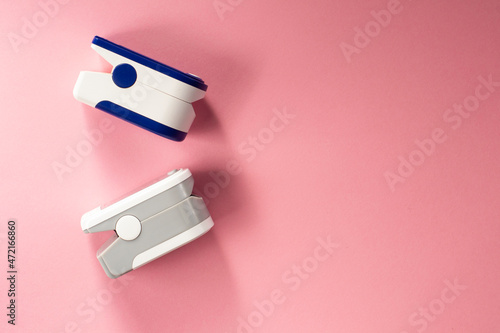 Wallpaper Mural Pulse oximeter for measuring level oxygen in  blood on a pink background. Pulse oximeter device without people. Torontodigital.ca