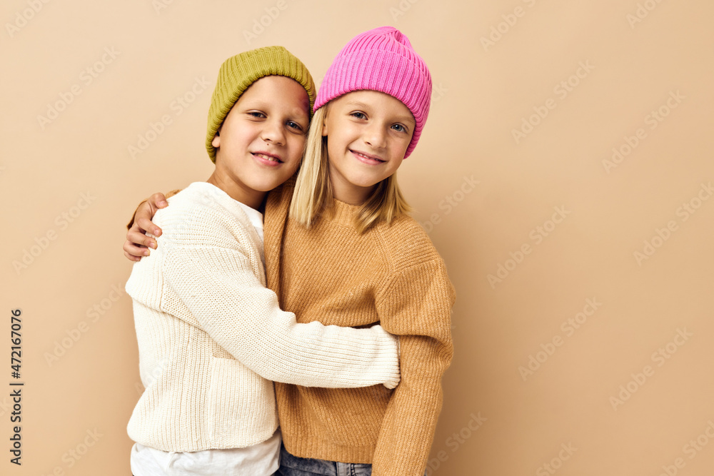 children fun fashion youth stylish-clothing childhood beige background children fun fashion youth stylish-clothing childhood beige background