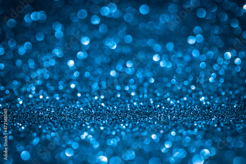Blue glitter light sparkling bokeh abstract background with defocused lights Christmas, Christmas holiday celebration, new year.