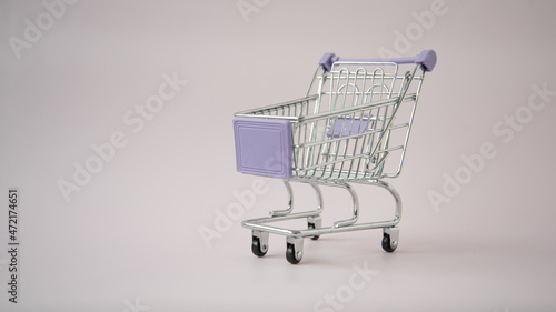 Shopping cart. Empty cart on a solid background. Concept