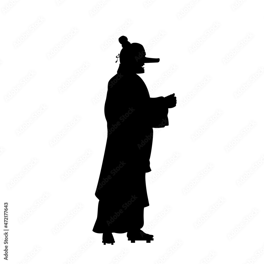 Silhouette of man in Tengu mask Silhouette of man in Tengu mask