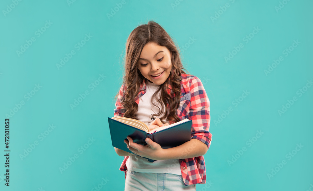 happy teen girl make notes on blue background, knowledge happy teen girl make notes on blue background, knowledge