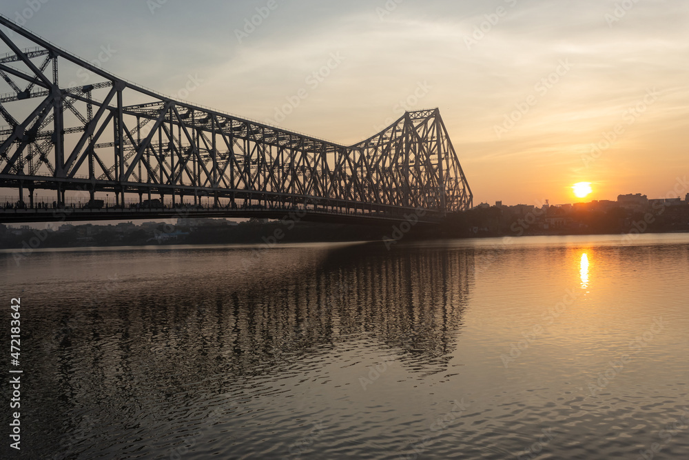 the beautiful morning view of howrah bridge, sunrise, Kolkata, India. the beautiful morning view of howrah bridge, sunrise, Kolkata, India.