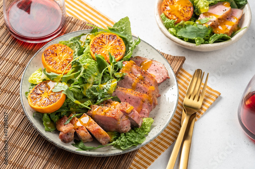 Tablou pe pânză Salad with roasted duck breast and grilled orange tangerines