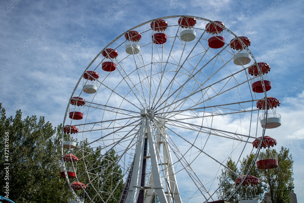 Empty Astrakhan Ferris wheel. Nobody in the amusement park due to quarantine restrictions. Empty Astrakhan Ferris wheel. Nobody in the amusement park due to quarantine restrictions.