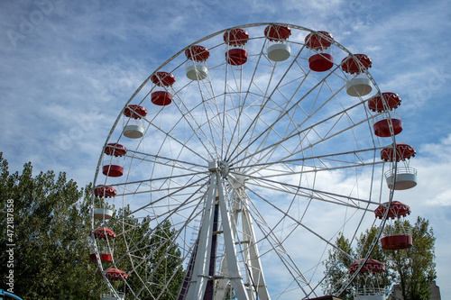 Empty Astrakhan Ferris wheel. Nobody in the amusement park due to quarantine restrictions.