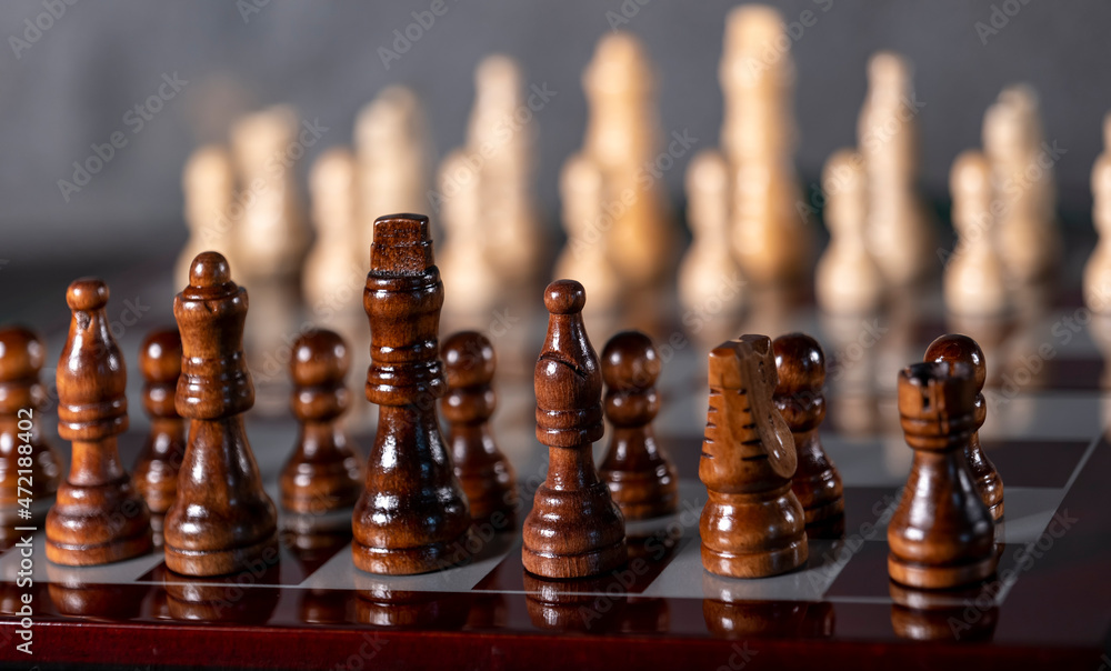 wooden chess on a dark background wooden chess on a dark background