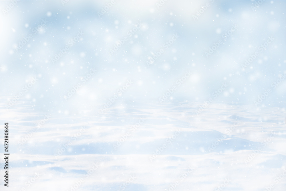 Abstract winter blurred background with snowfall