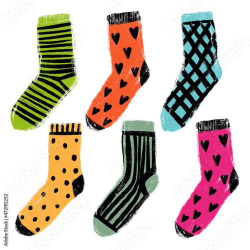 Set of bright warm cozy winter patterned socks photo