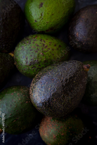 fresh avocado on black background