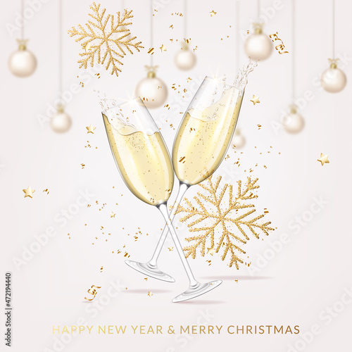 Christmas and New Year greeting card with wineglasses with champagne, snowflakes and christmas balls.	