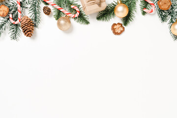 Minimal creative flat lay of christmas traditional composition and new year holiday season. Top view winter christmas decorations on white background with blank space for text. Copy space photography.