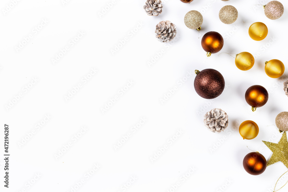 Christmas balls and pine cones on white background top view. Flat lay. Christmas and new year holiday background. Xmas greeting card concept Christmas balls and pine cones on white background top view. Flat lay. Christmas and new year holiday background. Xmas greeting card concept