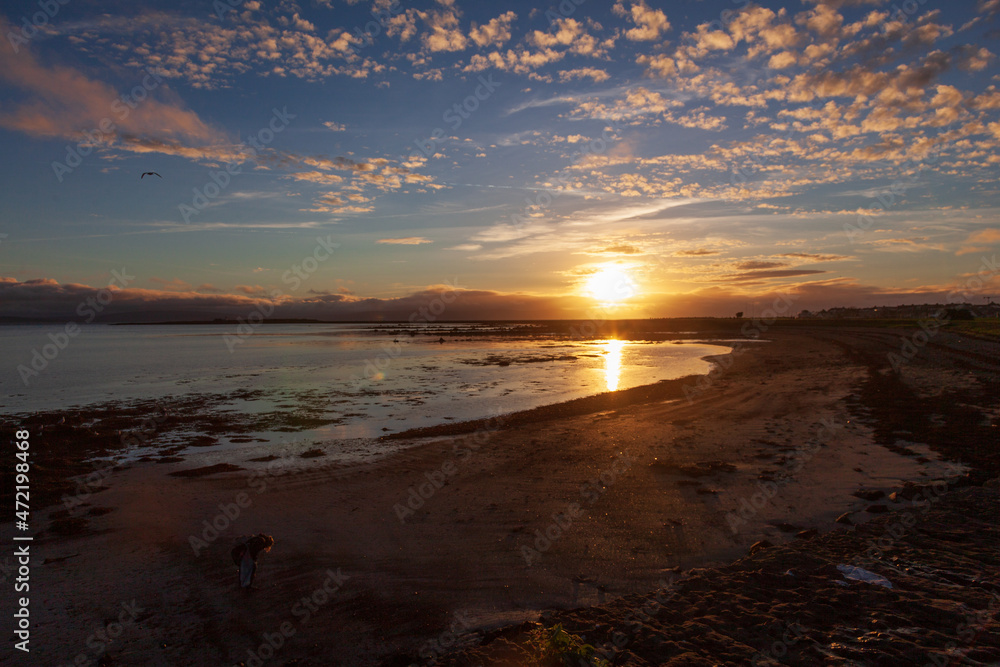 sunset on the beach in ireland