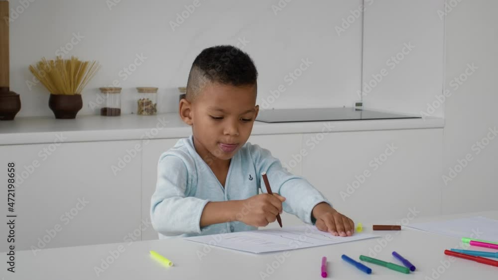 Funny Little African American Boy Drawing With Colorful Pencils At Home Funny Little African American Boy Drawing With Colorful Pencils At Home