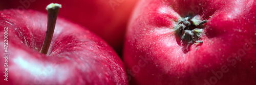 Red ripe and juicy apples detailed close up full frame ornamental fruit web banner background
