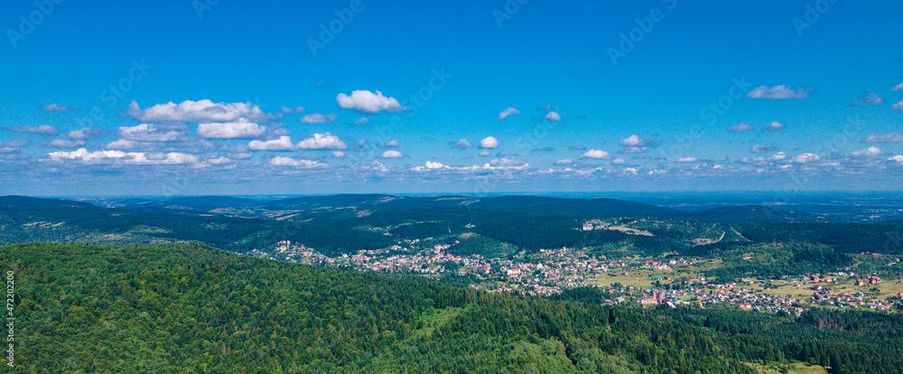 mountains aerial view in blue sky clouds