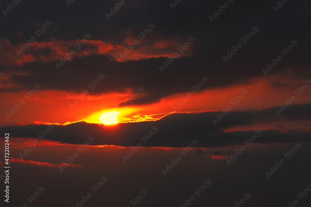 Fototapeta premium Apocalyptic red sky with dark clouds . Atmospheric mood heaven
