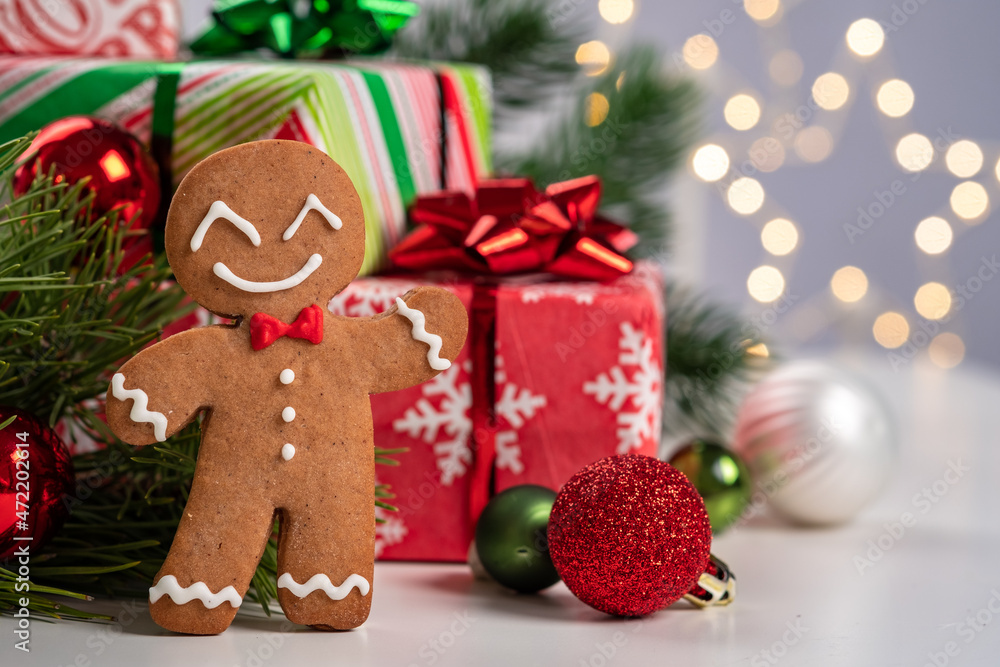 Christmas Decorations with Gingerbread man and Gift Box. Traditional holiday symbol. Christmas design.