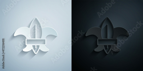Paper cut Fleur de lys or lily flower icon isolated on grey and black background. Paper art style. Vector