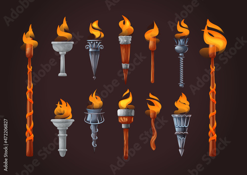 Antique fairy tail torch with brightly burning fire set. Ancient championship traditional light