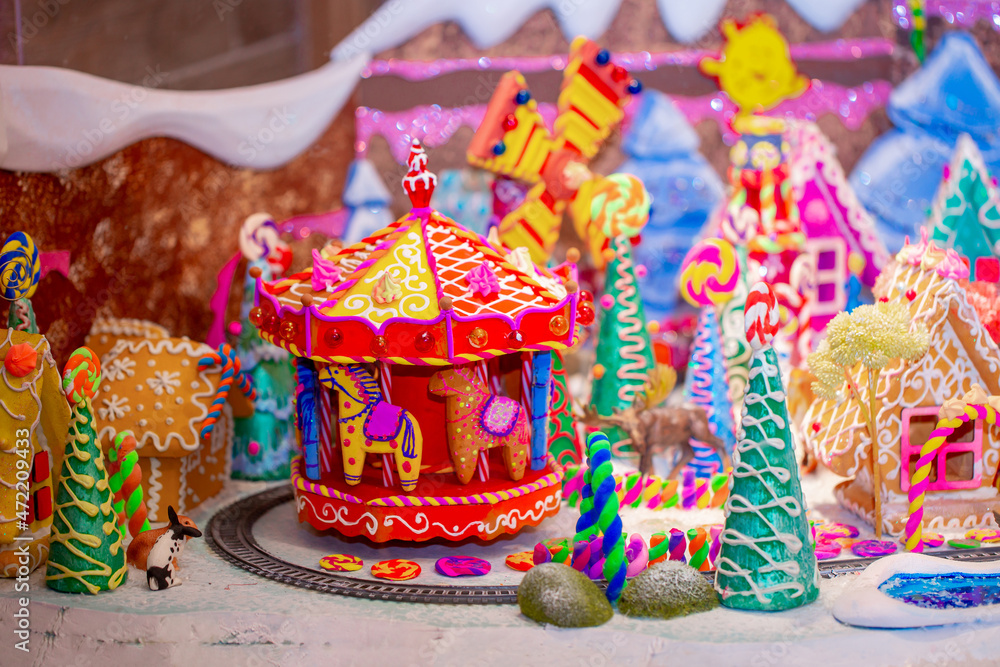 Christmas decorations in the interior. Festive background. New Year's room design, beautiful and shiny toys on the Christmas tree. Blurred background with copy space for text. Christmas decorations in the interior. Festive background. New Year's room design, beautiful and shiny toys on the Christmas tree. Blurred background with copy space for text.