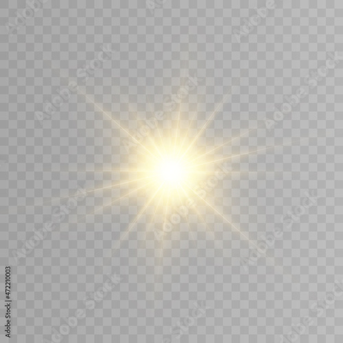 Yellow glowing flash of light on a transparent background. Vector illustration for decoration. A bright star, a flash of the sun. Glare texture.
