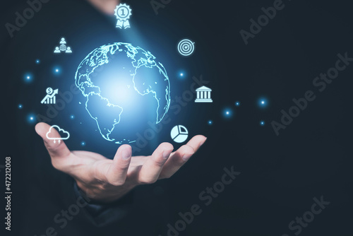 Businessman holding in hand global internet connection application technology. Big data, financial, banking and link tech concept.