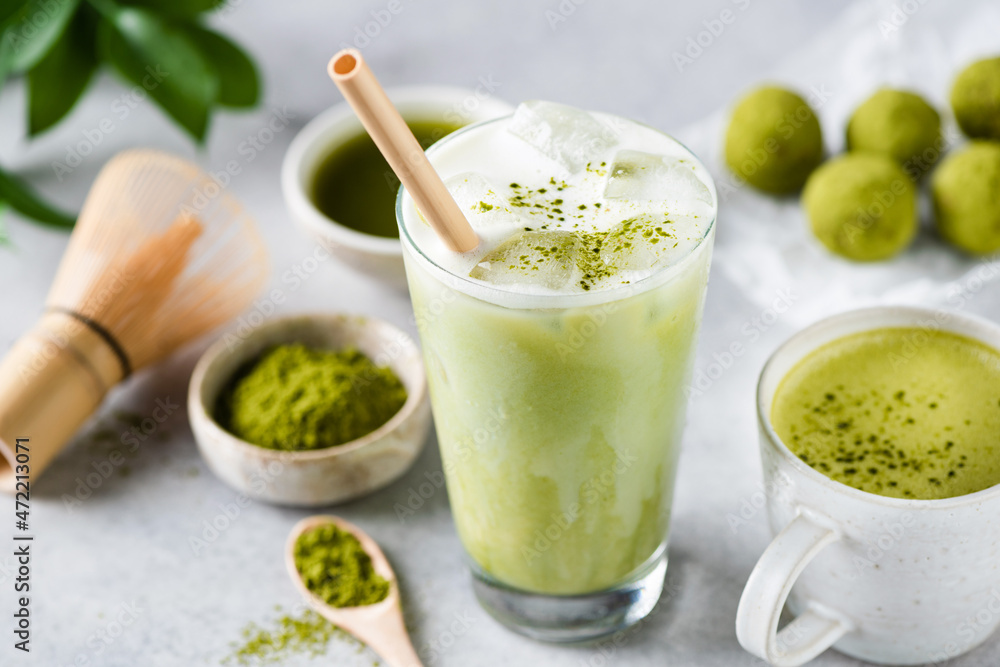 Delicious Vegan Matcha Ice Latte In Glass On Grey Stone Background Closeup View Delicious Vegan Matcha Ice Latte In Glass On Grey Stone Background Closeup View