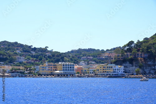 View to the Coastal landscape of Lacco Ameno from the sea, Mediterranean Sea coast, bay of Naples, Ischia island, Italy photo