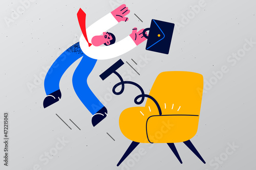 Male employee pushed from chair in company 