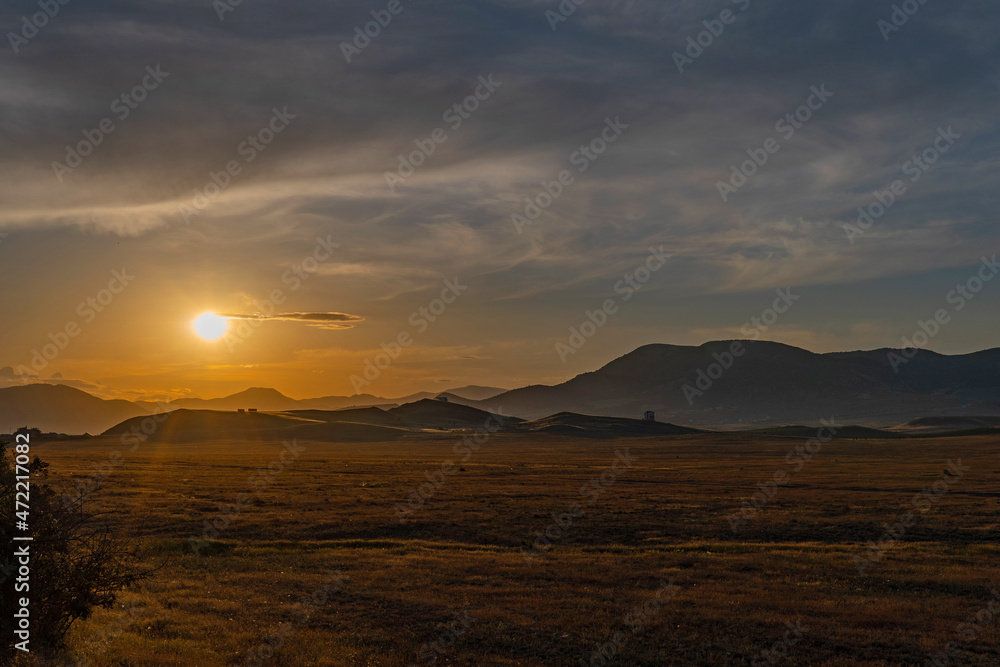 Beautiful sunset in a steppe valley