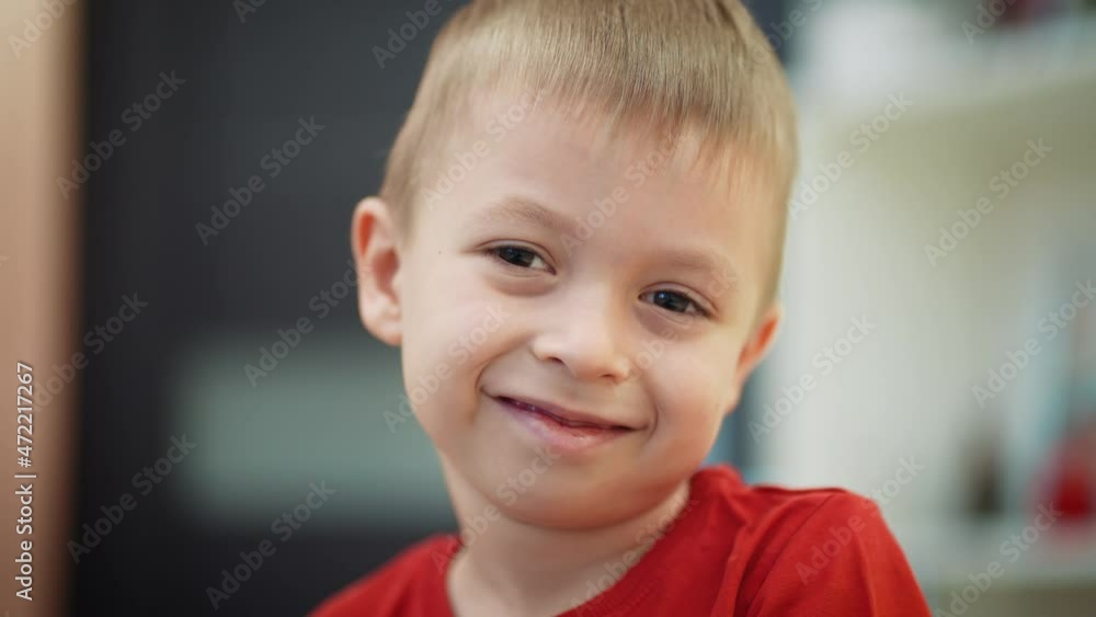Smiling cute a boy at home looks at the camera, children's happiness, a happy birthday. Smiling cute a boy at home looks at the camera, children's happiness, a happy birthday.