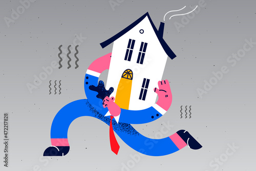Tired man carry house on back 