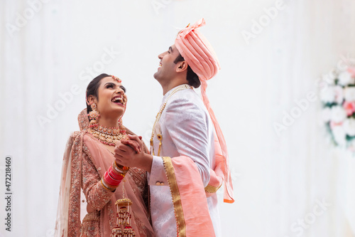 Portrait of wedding couple in a traditional wedding dress photo