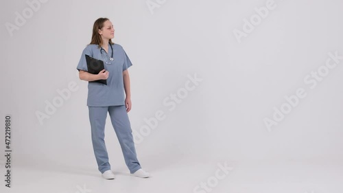 Full height female Doctor Wearing grey Coat
