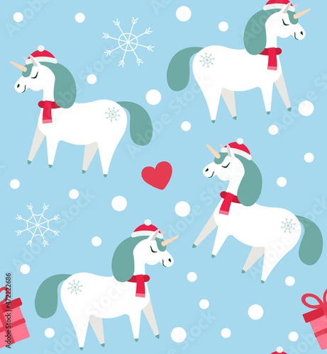 Vector seamless pattern of flat Christmas unicorn isolated on blue background